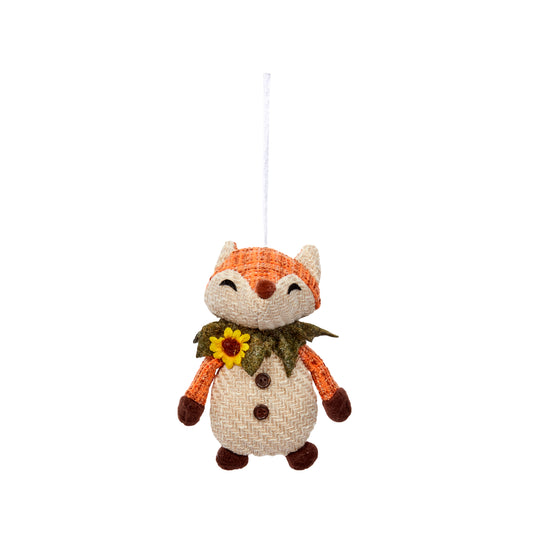 Knitted fox ornament with a sunflower on a white background