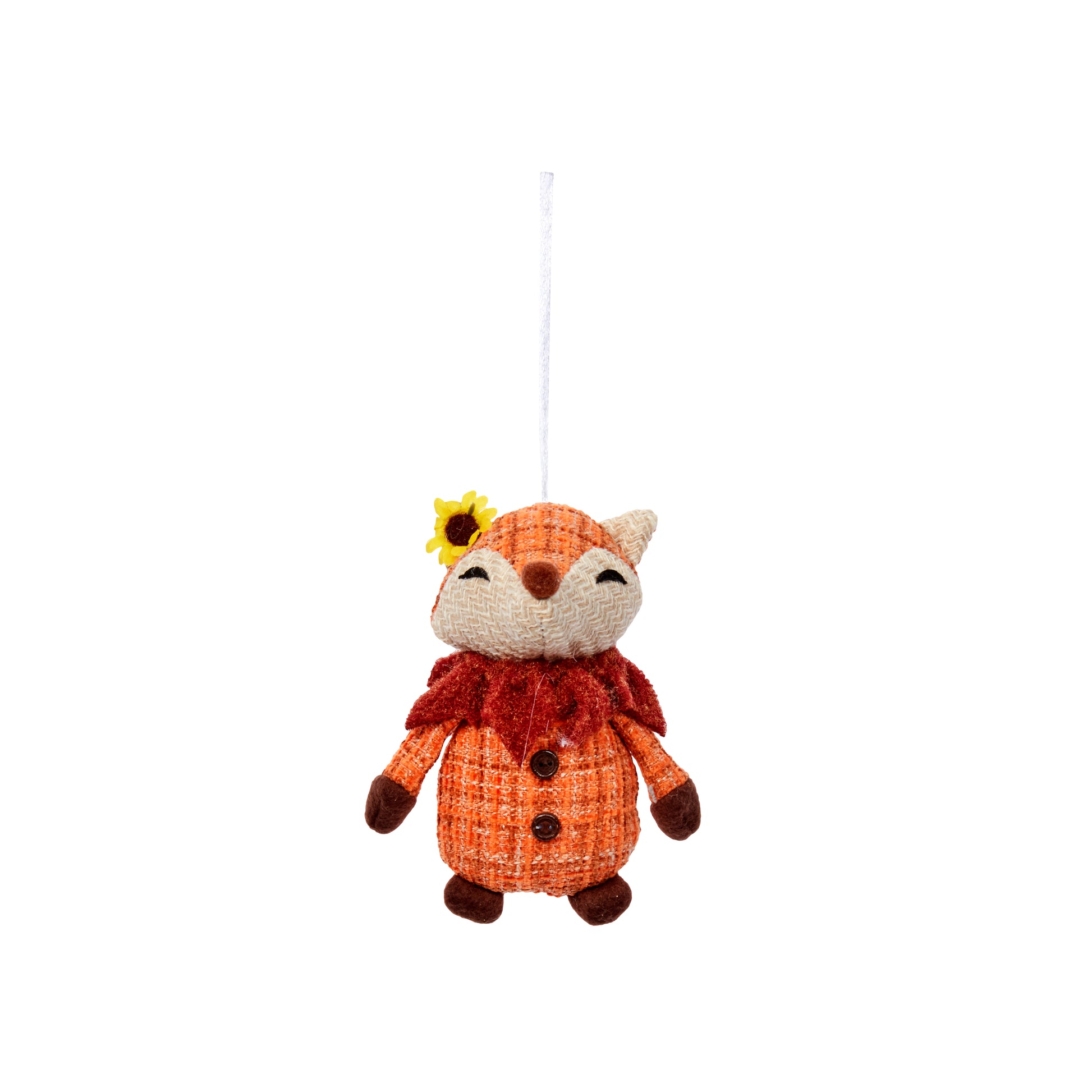 Plush fox toy with a yellow flower on a white background