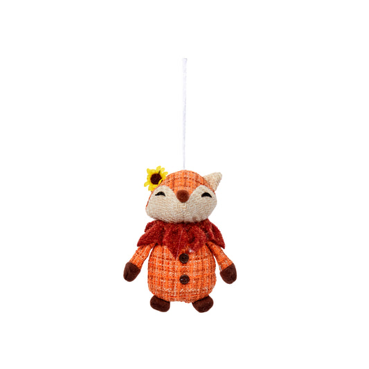 Plush fox toy with a yellow flower on a white background