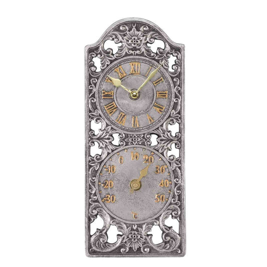 Decorative wall clock with intricate designs on a white background
