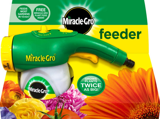 Miracle-Gro feeder with flowers and vegetables on a yellow background
