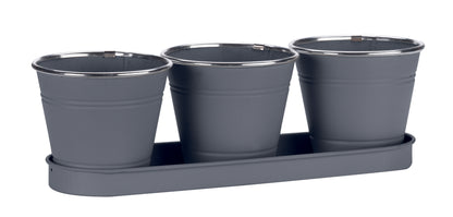 Set of three blue metal pots with a tray on a white background