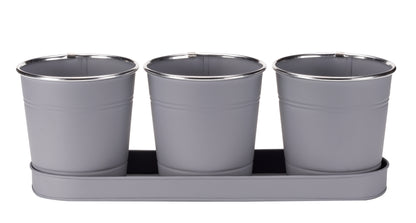 Three gray metal pots with a tray on a white background
