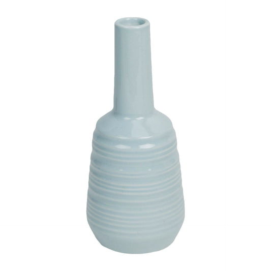 Light blue ribbed vase on a white background