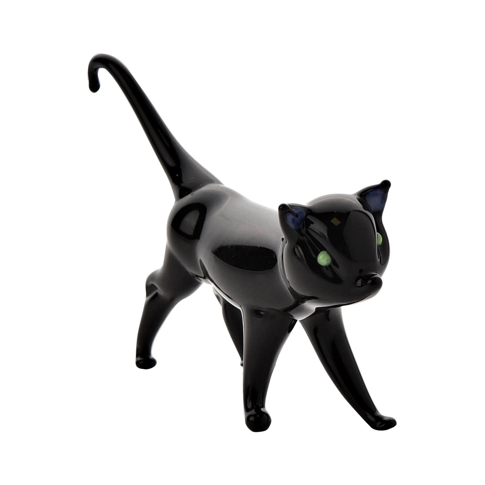 Black cat figurine on a white background