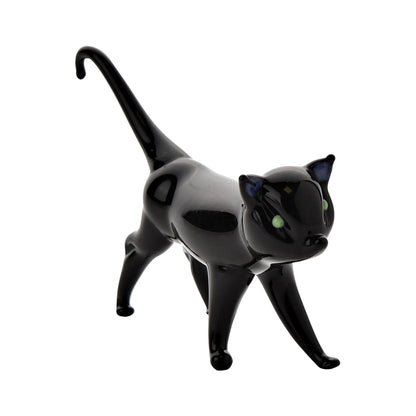 Black cat figurine on a white background