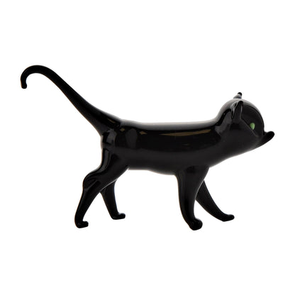 Black cat-shaped object on a white background