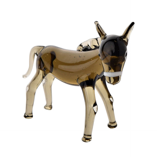 Glass donkey figurine on a white background