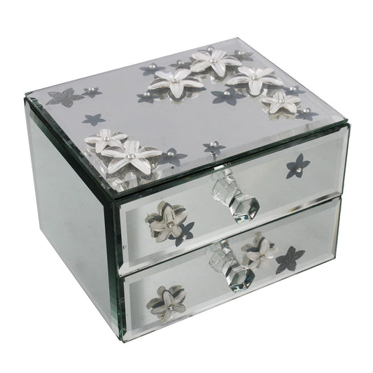 Mirror jewelry box with floral designs on a white background