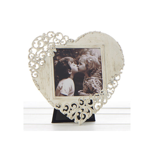 Heart-shaped photo frame with decorative lace details on a white background