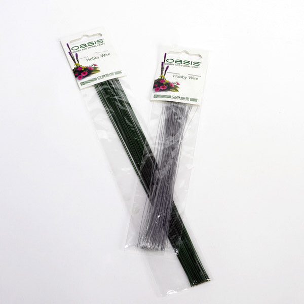 Two packages of Oasis hobby wire on a white background
