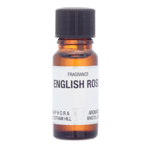 Small amber glass bottle labeled 'English Rose' on a white background