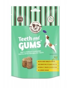 Dog treat package for teeth and gums with a green and white design.