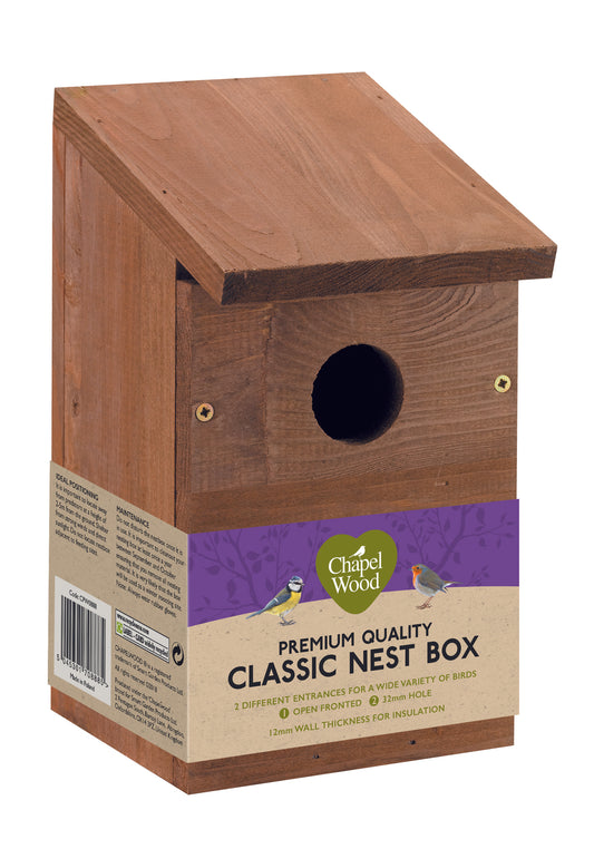 Wooden bird nest box with a label on a white background