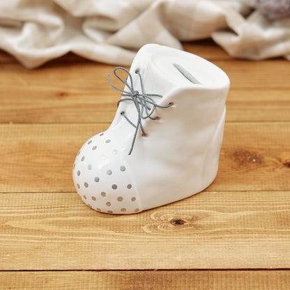White ceramic baby boot money box or piggy bank | Decorative nursery saving pot with grey polka dots and laces | New baby gift UK