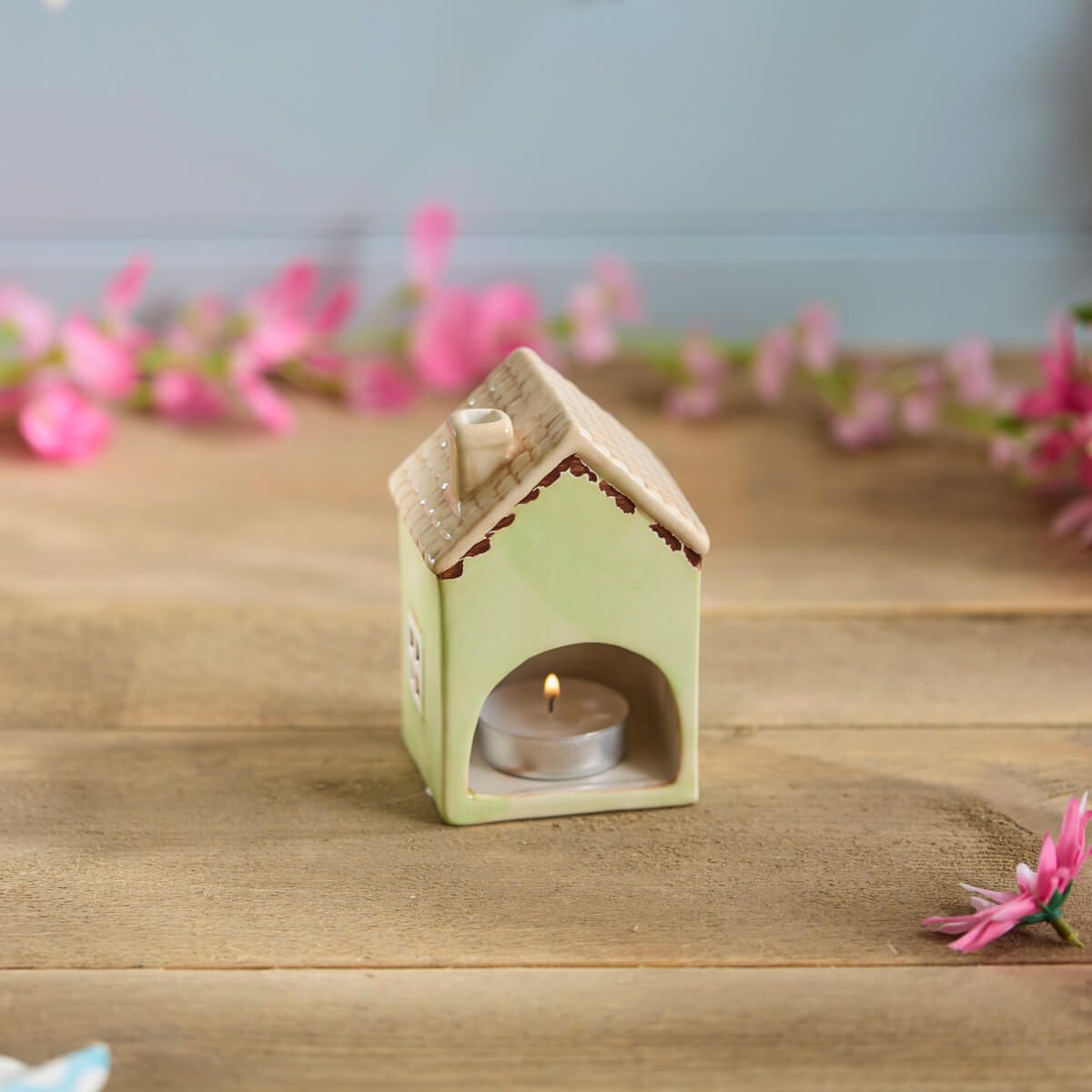 Light green ceramic miniature house ornament | Decorative cottage figurine with tan roof, heart window, and floral detail | UK home or garden décor