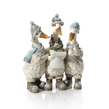 Christmas Carolling Goose Figure Trio | Resin decoration of three geese wearing knitted hats, scarves, and boots, holding a song sheet UK