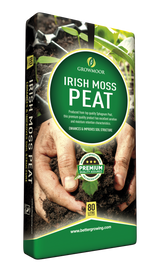 Packaging of Irish Moss Peat with hands holding soil and a visible brand logo.