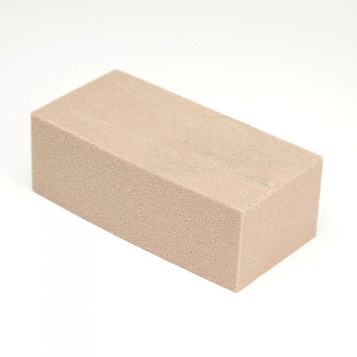 Beige rectangular brick on a white background