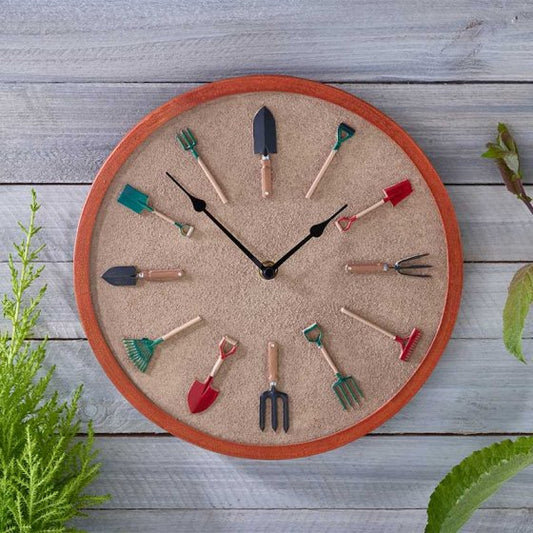 Clock on wooden background