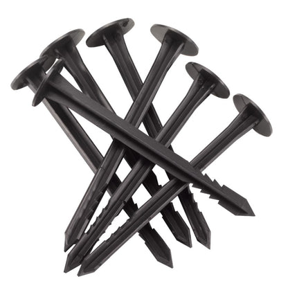 Black plastic stakes on a white background