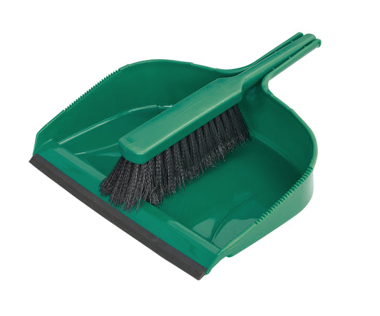 Green dustpan and brush set on a white background
