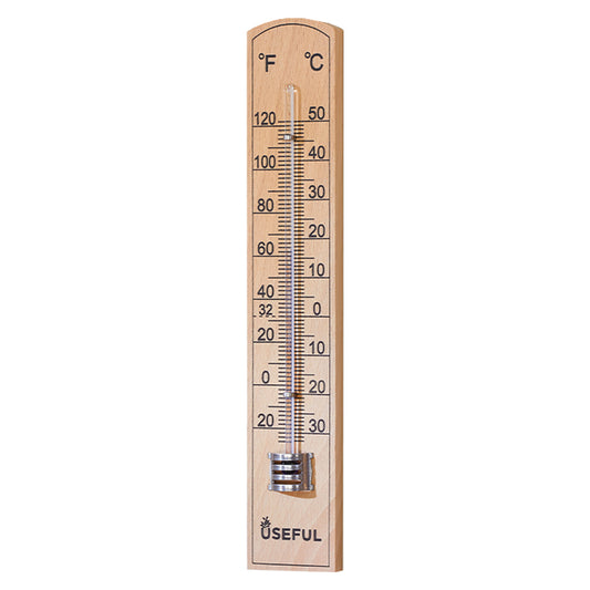 Wooden thermometer with temperature measurement scale on a white background