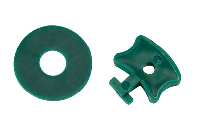 Two green plastic parts on a white background