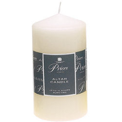 White altar candle with a label on a white background