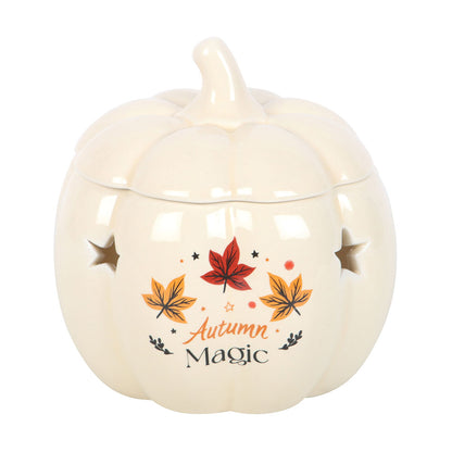 Ceramic pumpkin-shaped lantern with 'Autumn Magic' text and leaf designs on a white background