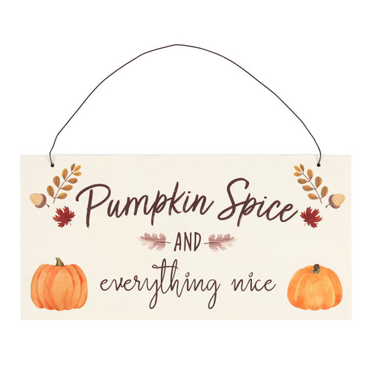 Decorative sign with 'Pumpkin Spice and everything nice' text and pumpkins on a white background
