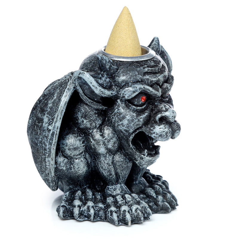Gargoyle shaped incense burner on a white background