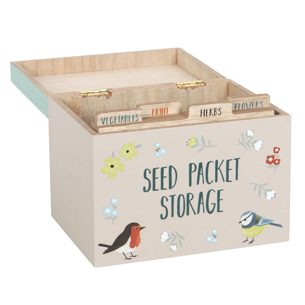 Wooden seed packet storage box with labels and illustrations on a white background