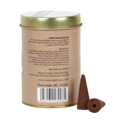 Incense cone packaging with gold lid and brown cones on a white background