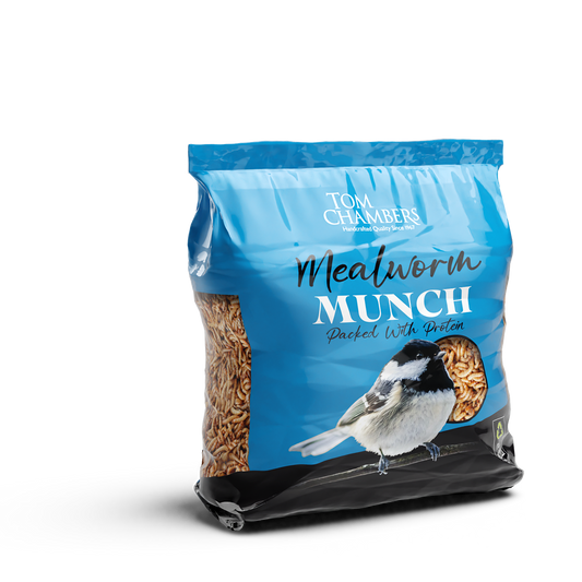 Bag of Tom Chambers Mealworm Munch bird food with a bird on the label.