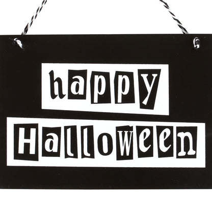 Black sign with 'happy Halloween' text on a white background