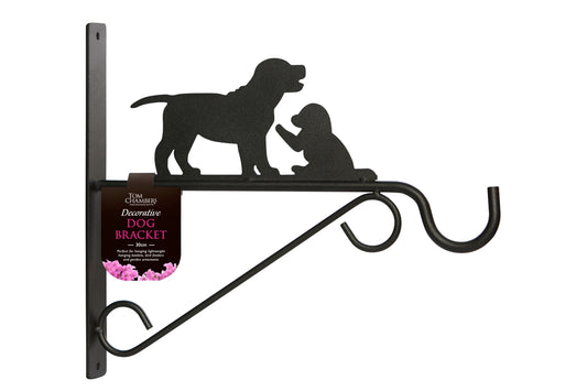 Decorative metal bracket with silhouettes of two dogs on a white background