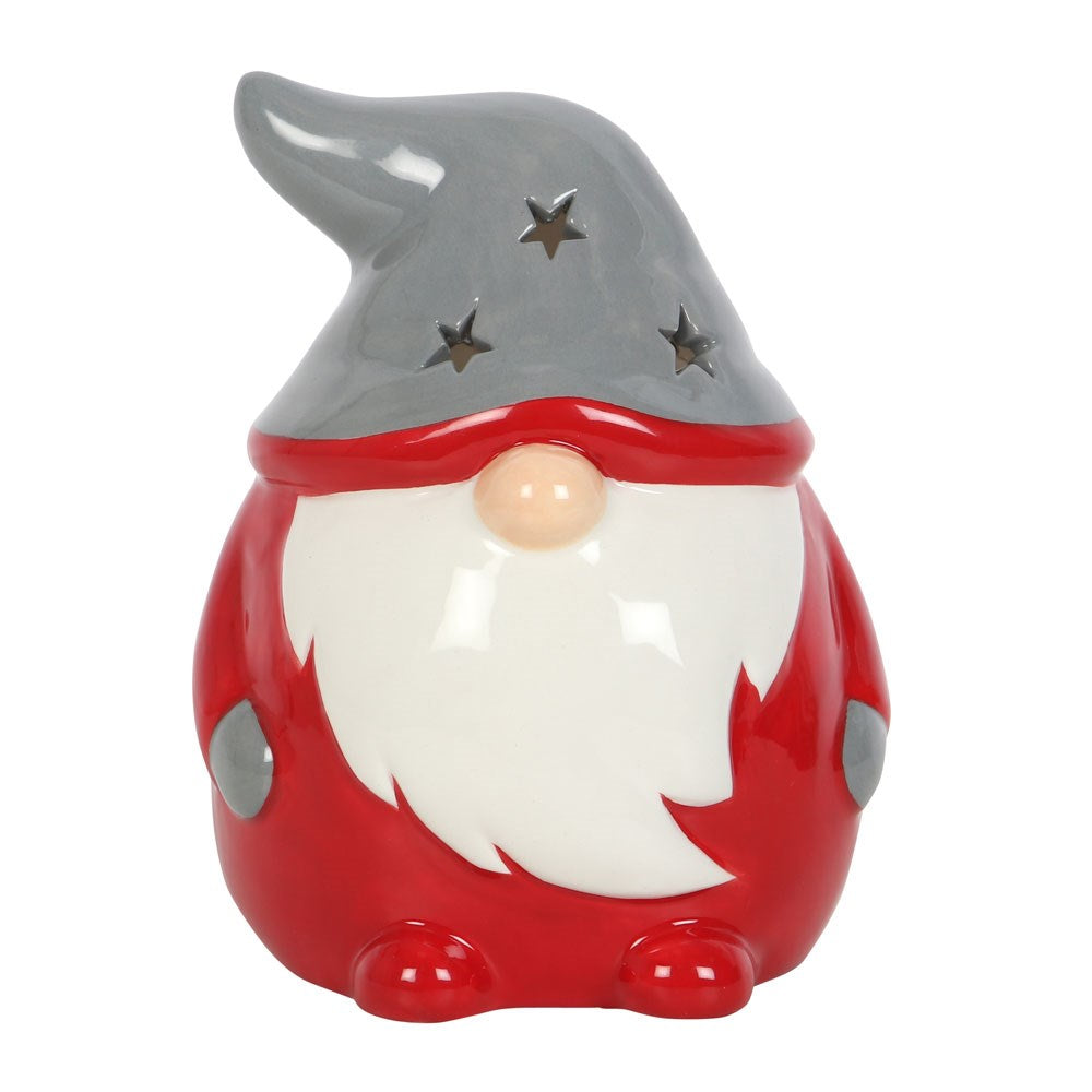 Decorative gnome figurine with a red outfit and gray hat on a white background