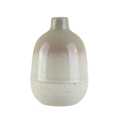 Ceramic vase with gradient design on a white background