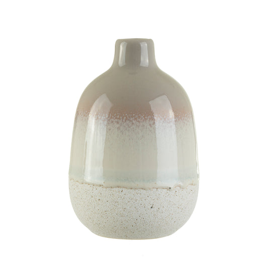 Ceramic vase with gradient design on a white background