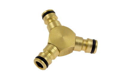 Brass Y-shaped plumbing fitting on a white background