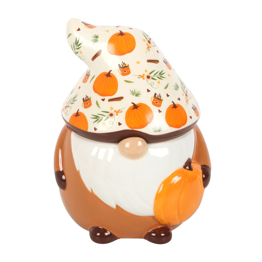 Ceramic gnome with pumpkin patterned hat on a white background