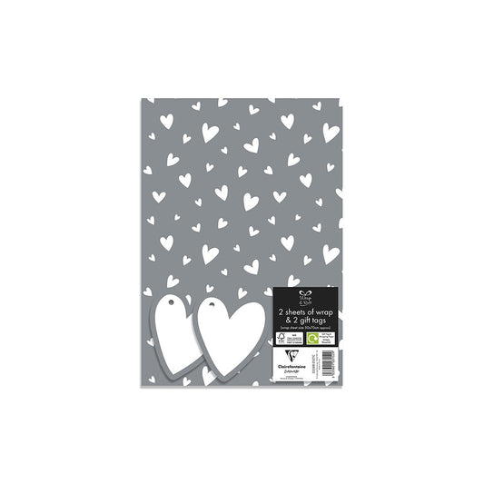Packaging of gray paper with white heart patterns and a visible brand label.