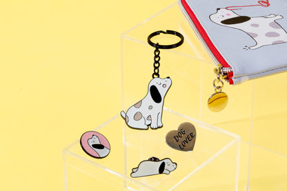 Spotty dog keyring on a yellow background