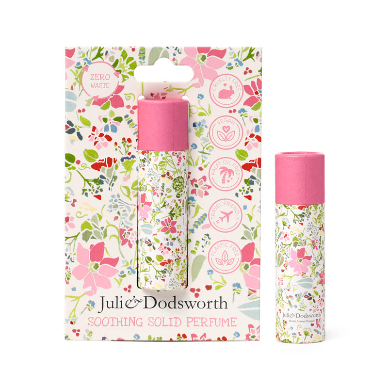 Julie & Dodsworth soothing solid perfume with floral packaging on a white background
