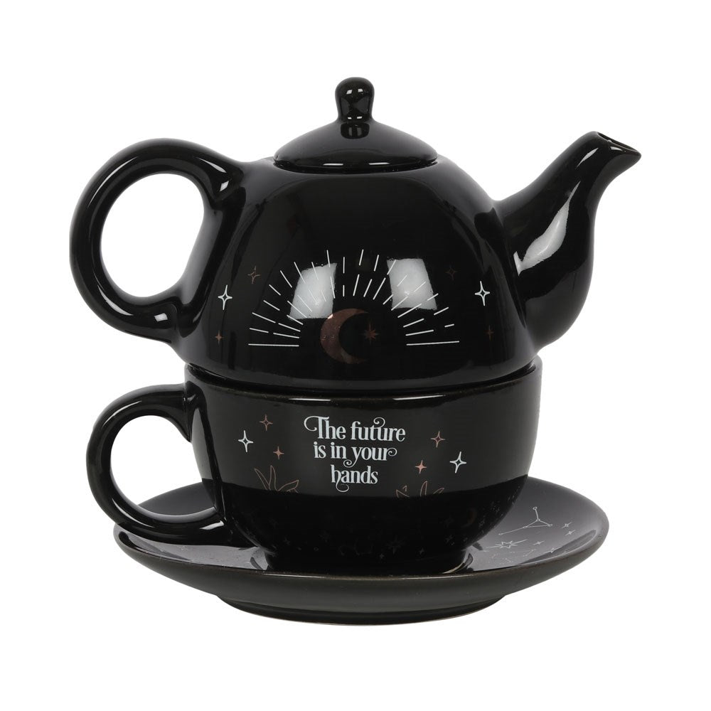 Black teapot and mug set with 'The future is in your hands' text on a white background