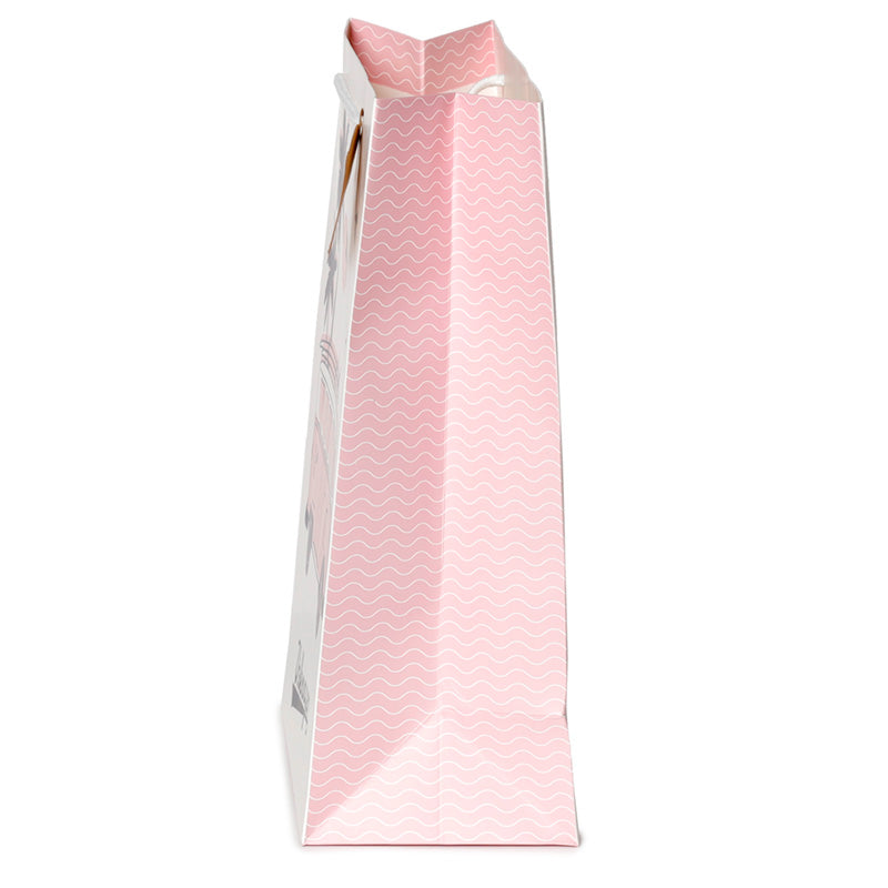 Pink paper bag with a white handle on a white background