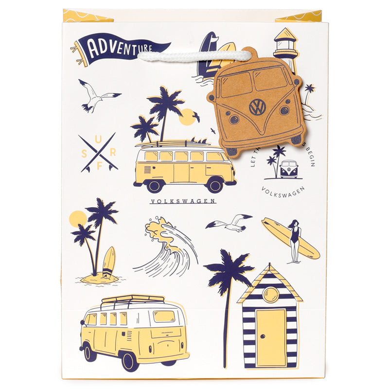 Gift bag with Volkswagen camper vans, palm trees, and beach elements on a white background