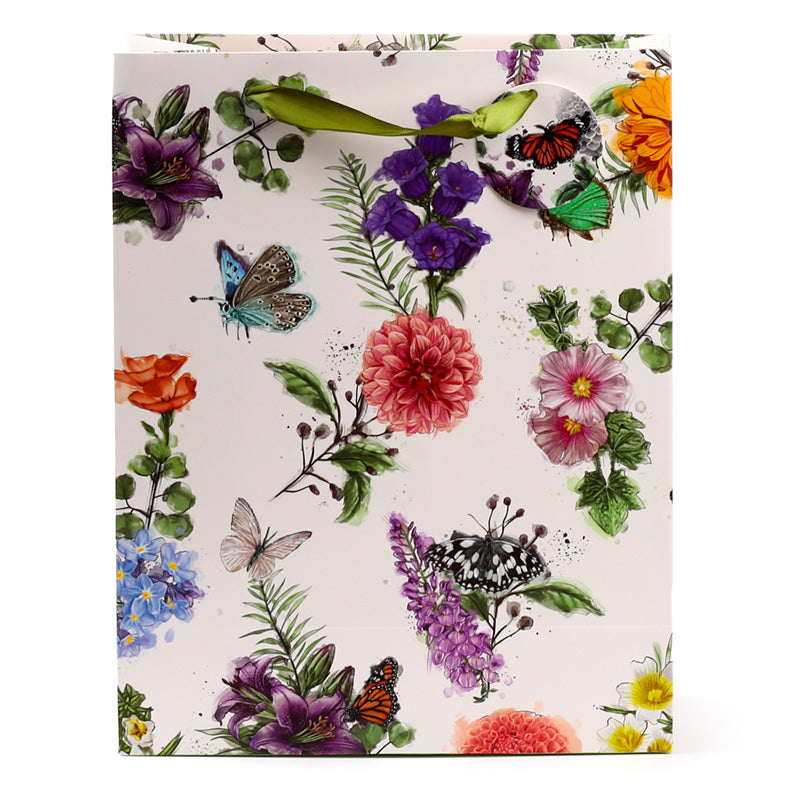 Gift bag with floral and butterfly design on a white background