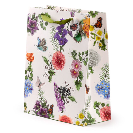 Gift bag with floral and butterfly design on a white background